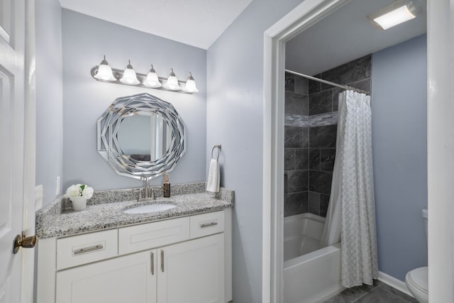 full bathroom featuring shower / bath combination with curtain, vanity, and toilet