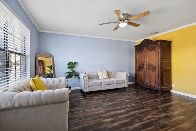 living room featuring dark hardwood / wood-style floors, ceiling fan, and ornamental molding