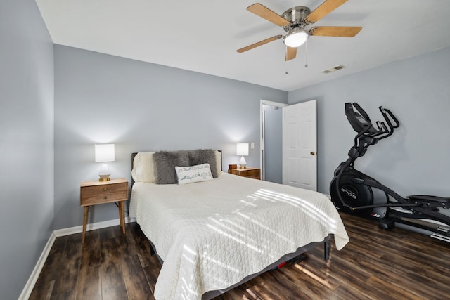 bedroom featuring dark hardwood / wood-style floors and ceiling fan