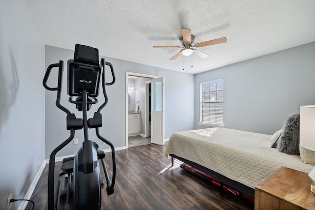 bedroom featuring a textured ceiling, dark hardwood / wood-style floors, ceiling fan, and ensuite bathroom