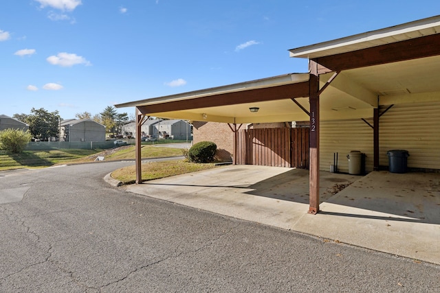 view of vehicle parking featuring a carport