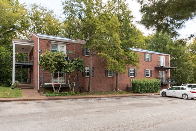 view of property with central AC unit