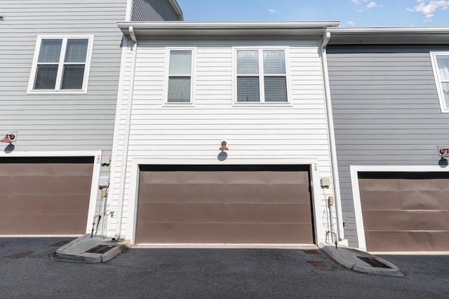 view of home's exterior with a garage