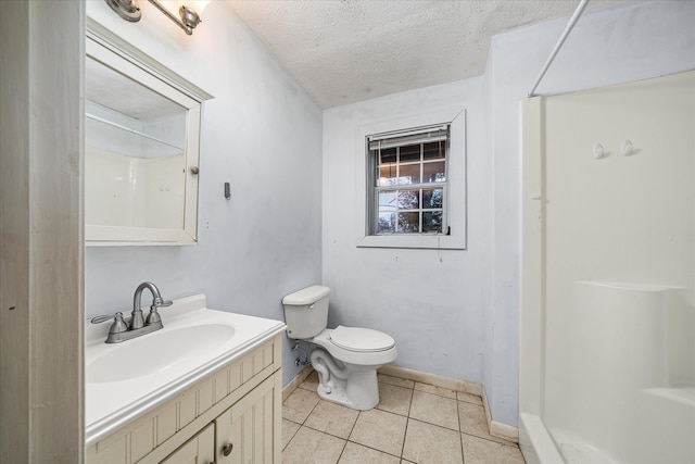 bathroom with tile patterned floors, walk in shower, a textured ceiling, vanity, and toilet