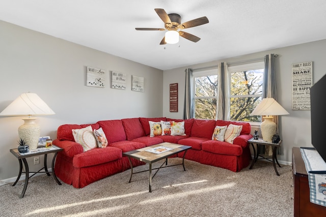 living room featuring ceiling fan and carpet floors