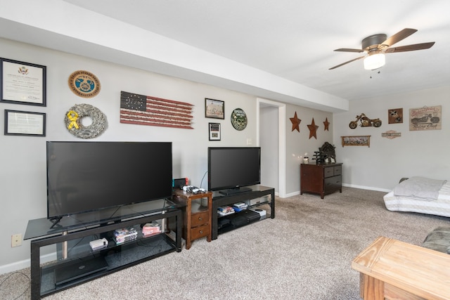 living room with carpet and ceiling fan