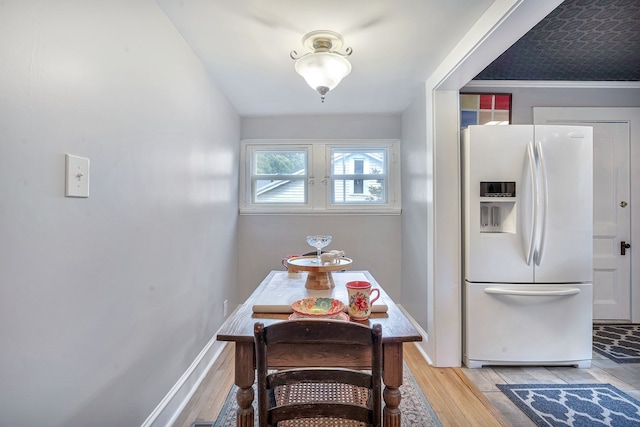 dining room featuring light hardwood / wood-style flooring