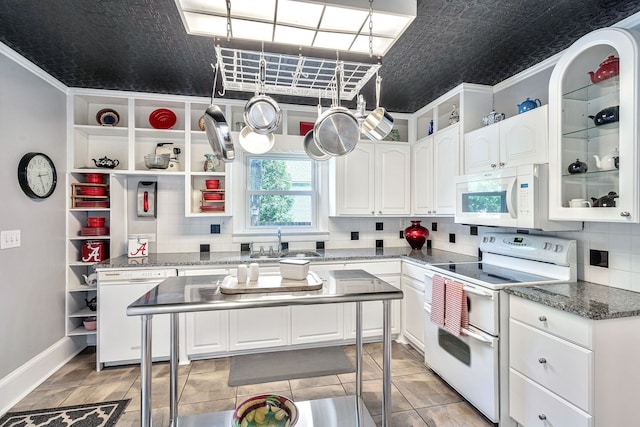 kitchen featuring decorative backsplash, white appliances, crown molding, and sink