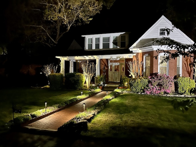 view of front of home with a front lawn