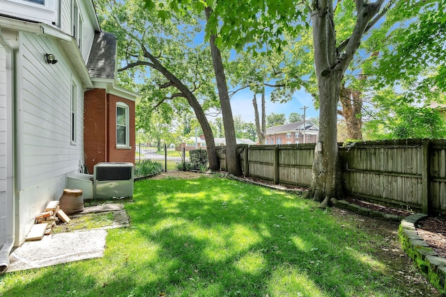 view of yard featuring central AC unit