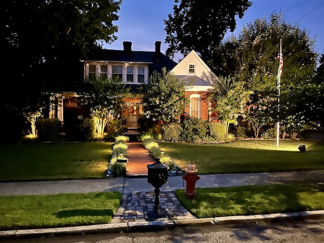 view of front of home with a front yard