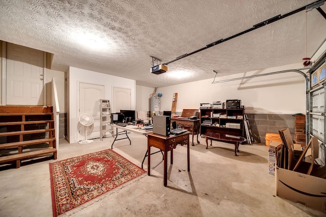 interior space with a garage door opener and water heater