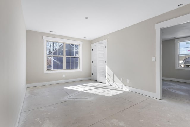 spare room with a wealth of natural light