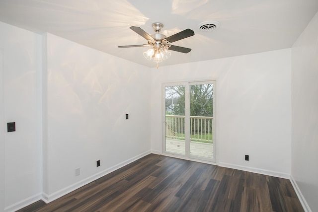 unfurnished room with ceiling fan and dark hardwood / wood-style floors