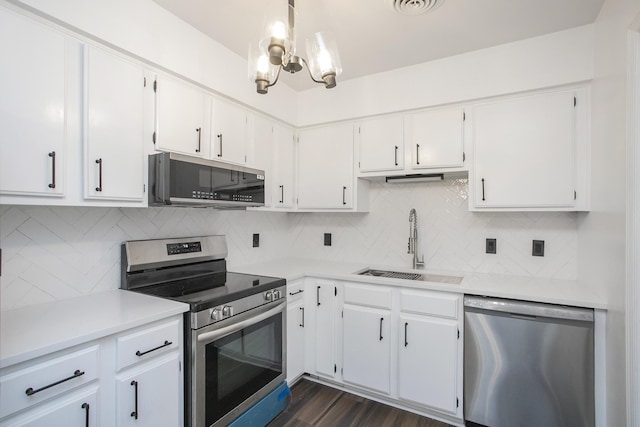 kitchen featuring white cabinetry, sink, and stainless steel appliances