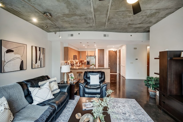 living room featuring ceiling fan