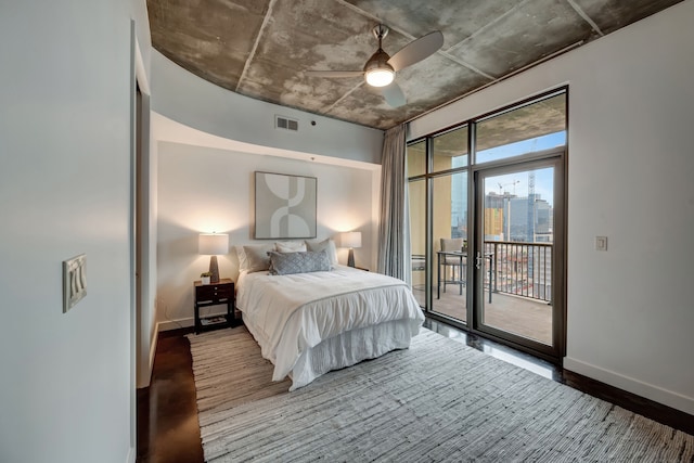 bedroom with access to exterior, ceiling fan, and hardwood / wood-style floors