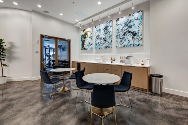 dining area featuring sink