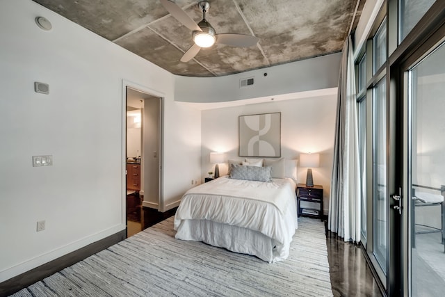 bedroom with ceiling fan and dark hardwood / wood-style floors