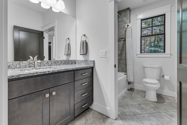 full bathroom featuring tile patterned floors, vanity, toilet, and shower / tub combo