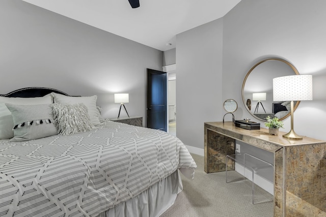 bedroom featuring light colored carpet