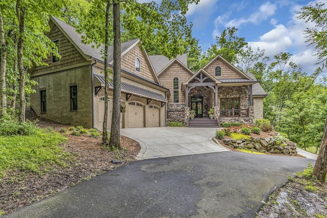 view of front of home featuring french doors and a garage