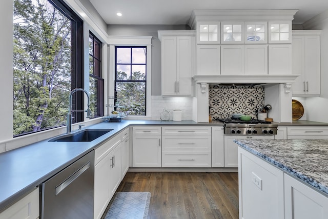 kitchen with white cabinets, stainless steel appliances, and sink