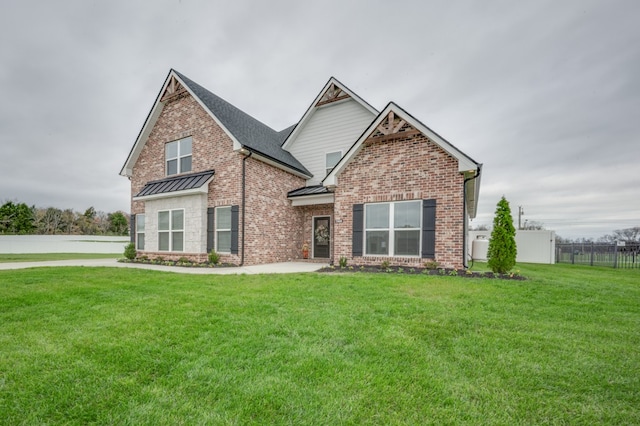 craftsman house with a front lawn