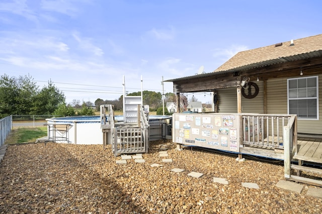 view of yard featuring a swimming pool side deck