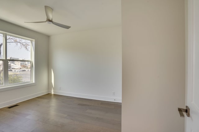 unfurnished room featuring wood-type flooring and ceiling fan