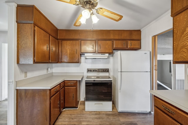 kitchen featuring white appliances, light hardwood / wood-style flooring, ceiling fan, and ornamental molding