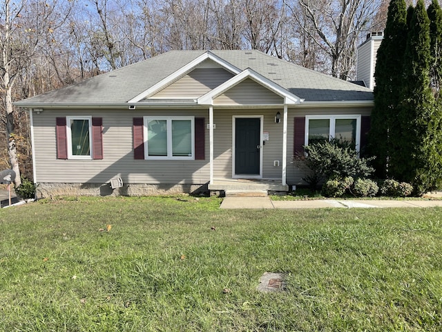 view of front of property with a front lawn