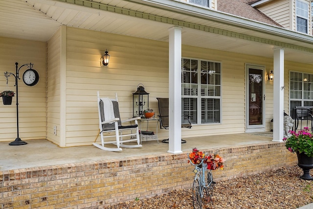 doorway to property with covered porch