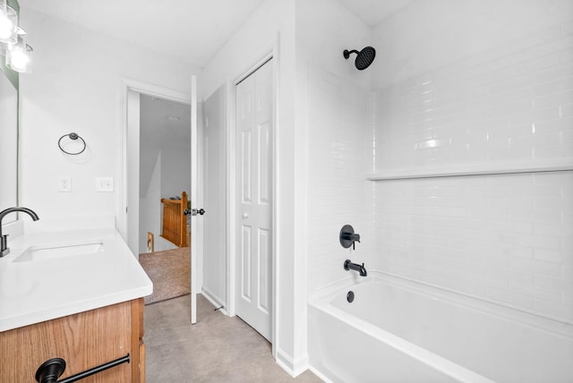 bathroom featuring vanity and tiled shower / bath combo