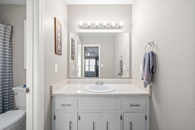 bathroom with vanity and toilet