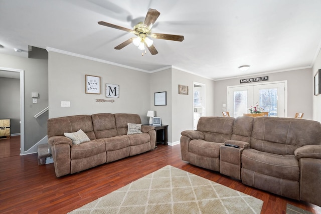 living room featuring ceiling fan, dark hardwood / wood-style flooring, crown molding, and french doors