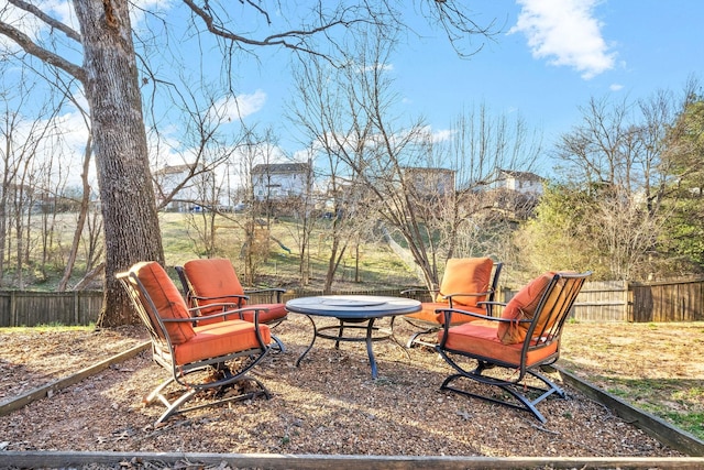 view of yard with an outdoor fire pit