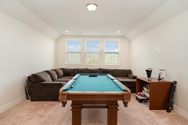 game room with light colored carpet, vaulted ceiling, and billiards