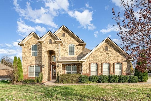 view of front of house with a front lawn