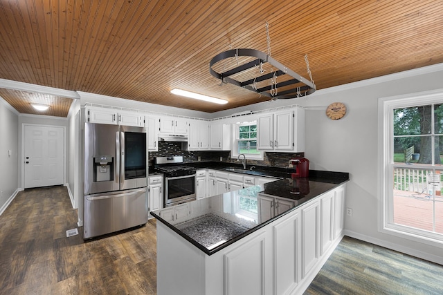 kitchen with kitchen peninsula, white cabinetry, stainless steel appliances, and ornamental molding