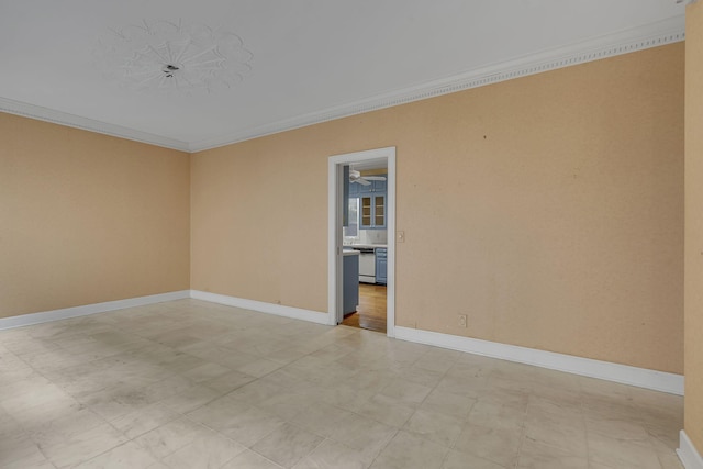 empty room featuring ornamental molding