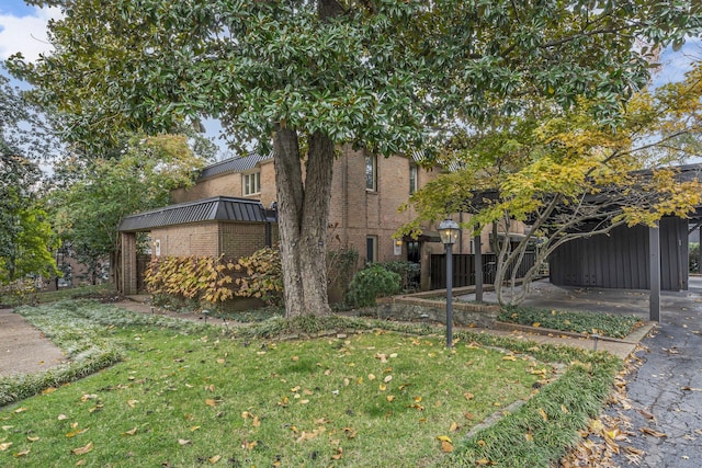 exterior space with a yard and a patio