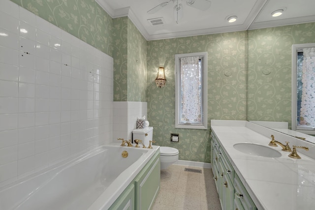 bathroom featuring ornamental molding, vanity, tile patterned flooring, toilet, and a tub