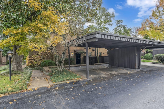 view of parking with a carport