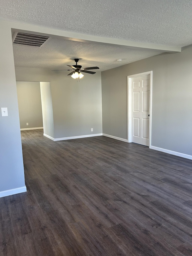 121 Poplar St N, Cowan, TN 37318 - empty room with a ceiling fan, dark wood-type flooring, and a textured ceiling