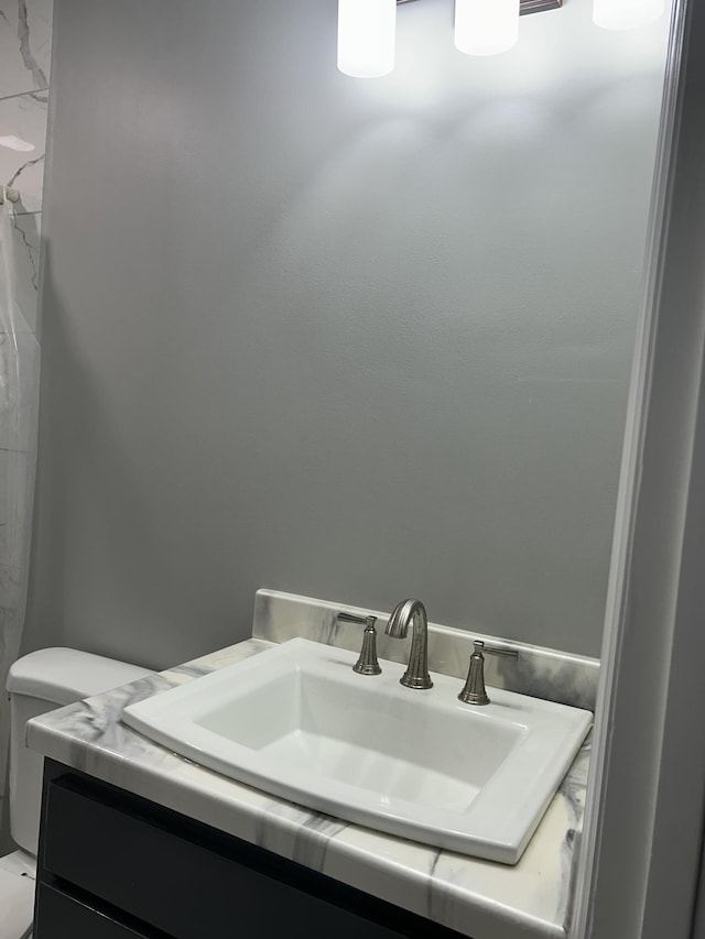 121 Poplar St N, Cowan, TN 37318 - bathroom with toilet and vanity