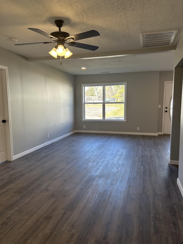 unfurnished room featuring ceiling fan, dark hardwood / wood-style flooring, and a textured ceiling