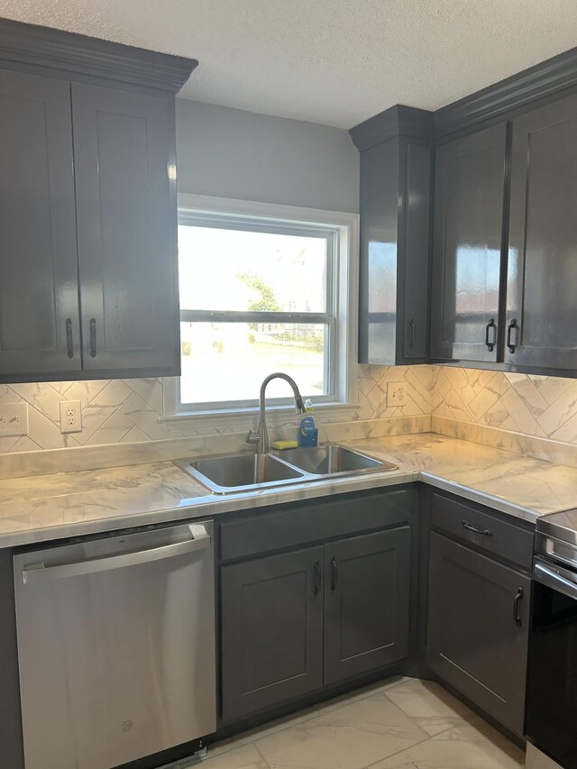 kitchen featuring backsplash, sink, stainless steel dishwasher, light stone countertops, and electric range oven