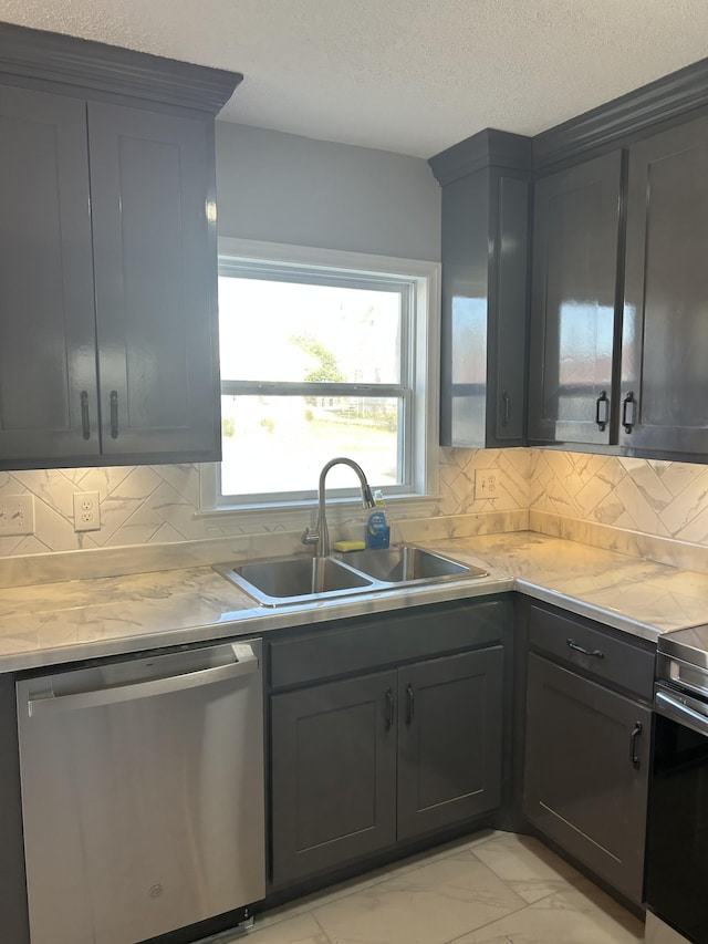 121 Poplar St N, Cowan, TN 37318 - kitchen with appliances with stainless steel finishes, light marble finish floors, tasteful backsplash, and a textured ceiling