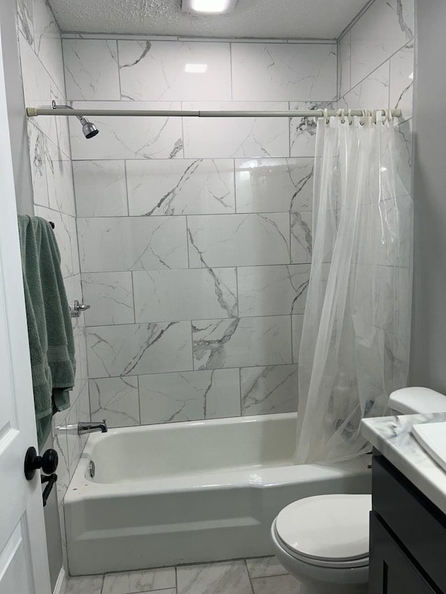 full bathroom with a textured ceiling, vanity, shower / tub combo, and toilet